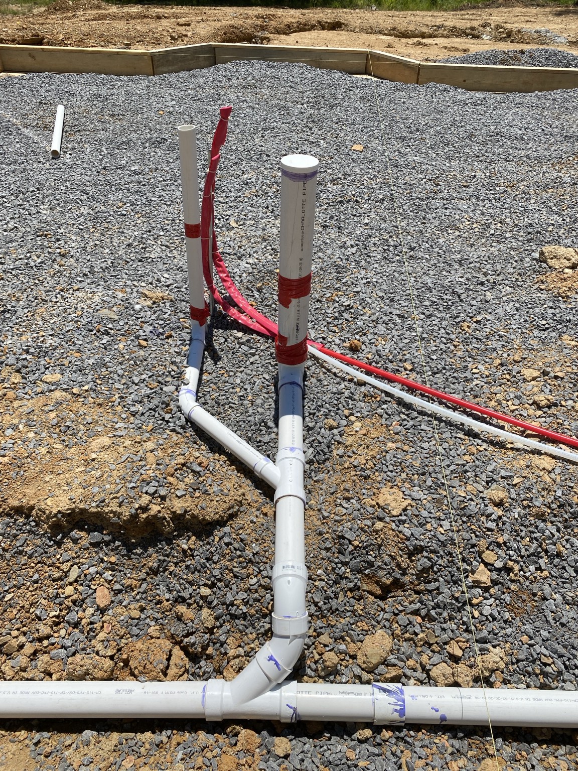 Underground plumbing rough-in for a new construction project